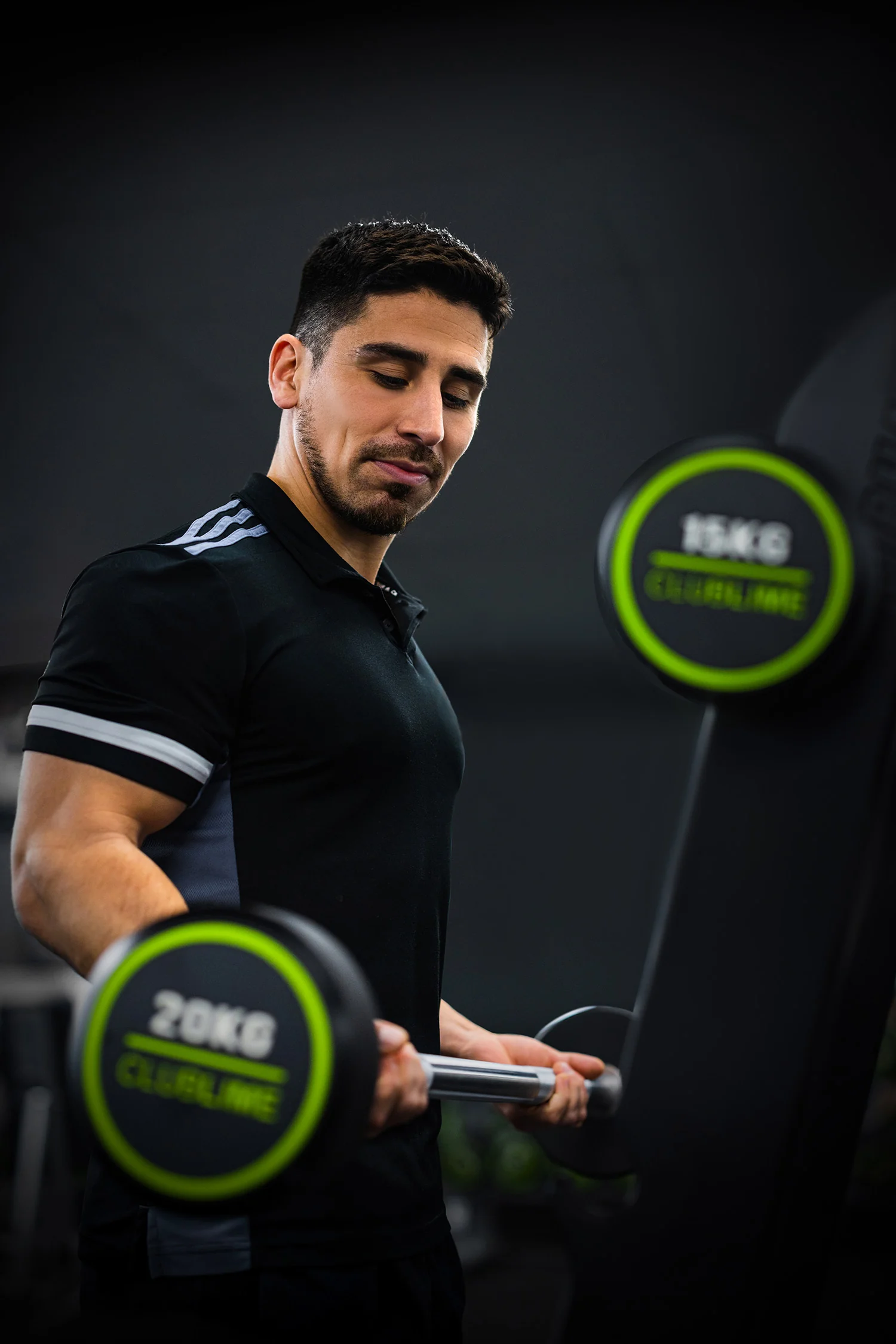 Member training with dumbbells at Club Lime